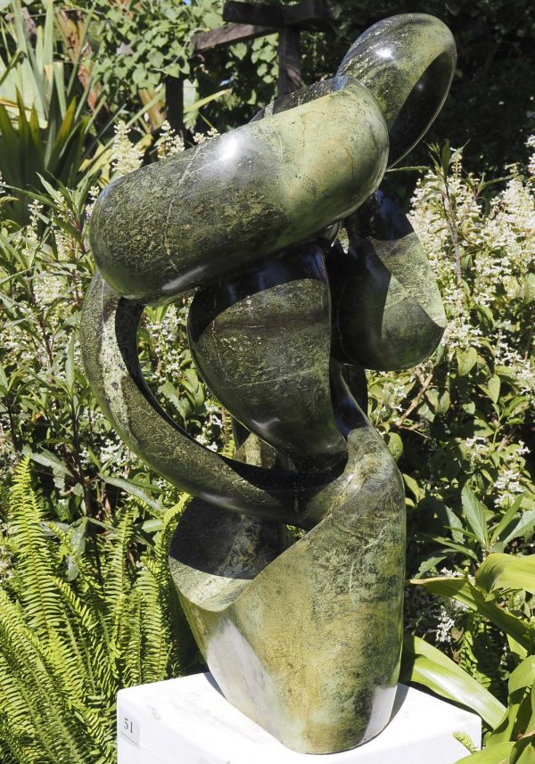 Abstract garden stone sculpture - Growing Force by Willard Bopoto right side