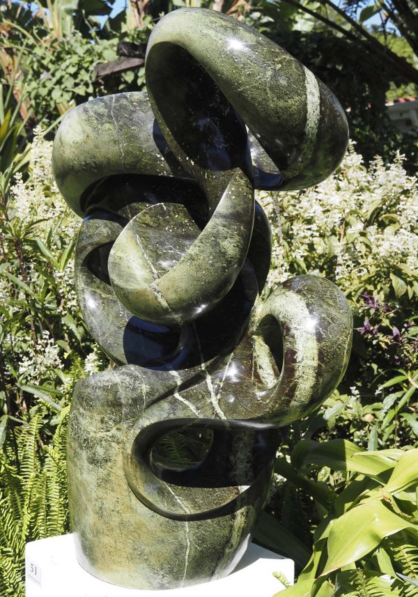 Abstract garden stone sculpture - Growing Force by Willard Bopoto back right