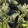 Abstract garden stone sculpture - Growing Force by Willard Bopoto left side