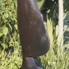 Stone sculpture woman's head Wishing Kiss by Lovemore Bonjisi back right