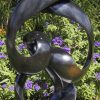 Original unique abstract sculpture - Sisters In Harmony by Tonderai Sowa front left