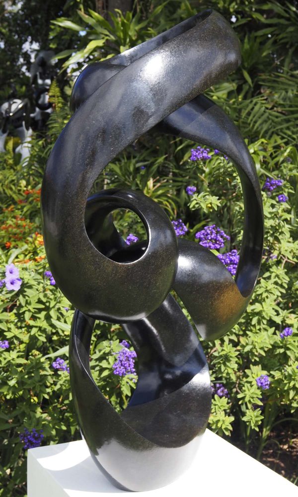 Original unique abstract sculpture - Sisters In Harmony by Tonderai Sowa left side