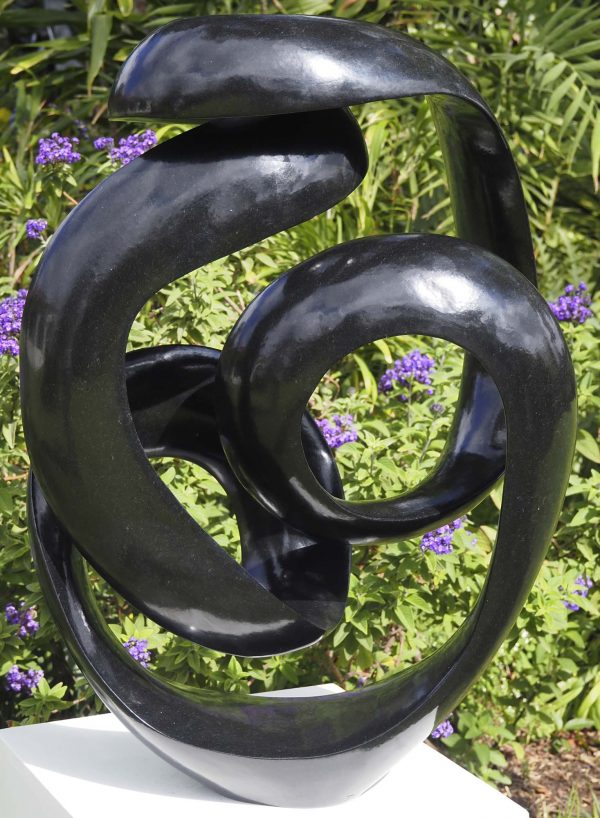 Abstract black stone sculpture - Opportunity by Tonderai Sowa back