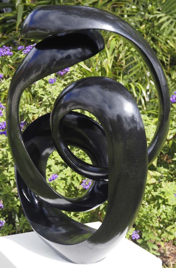 Abstract black stone sculpture - Opportunity by Tonderai Sowa back right