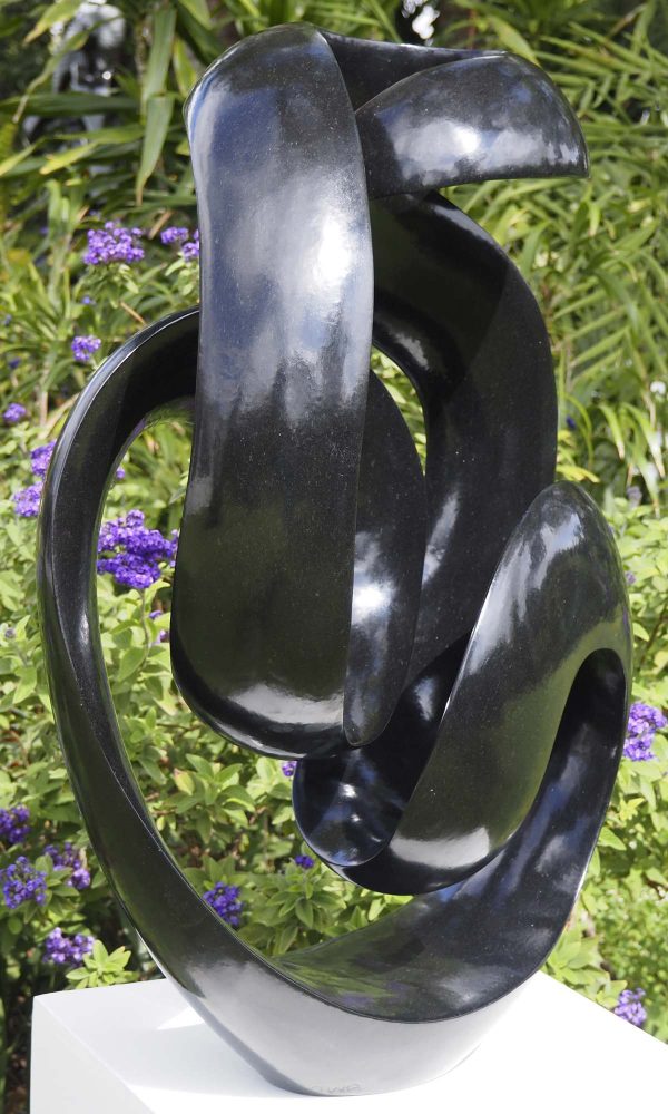 Abstract black stone sculpture - Opportunity by Tonderai Sowa front left