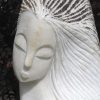 White marble bust head Staying Positive by Tutani Mgabazi - close up of face